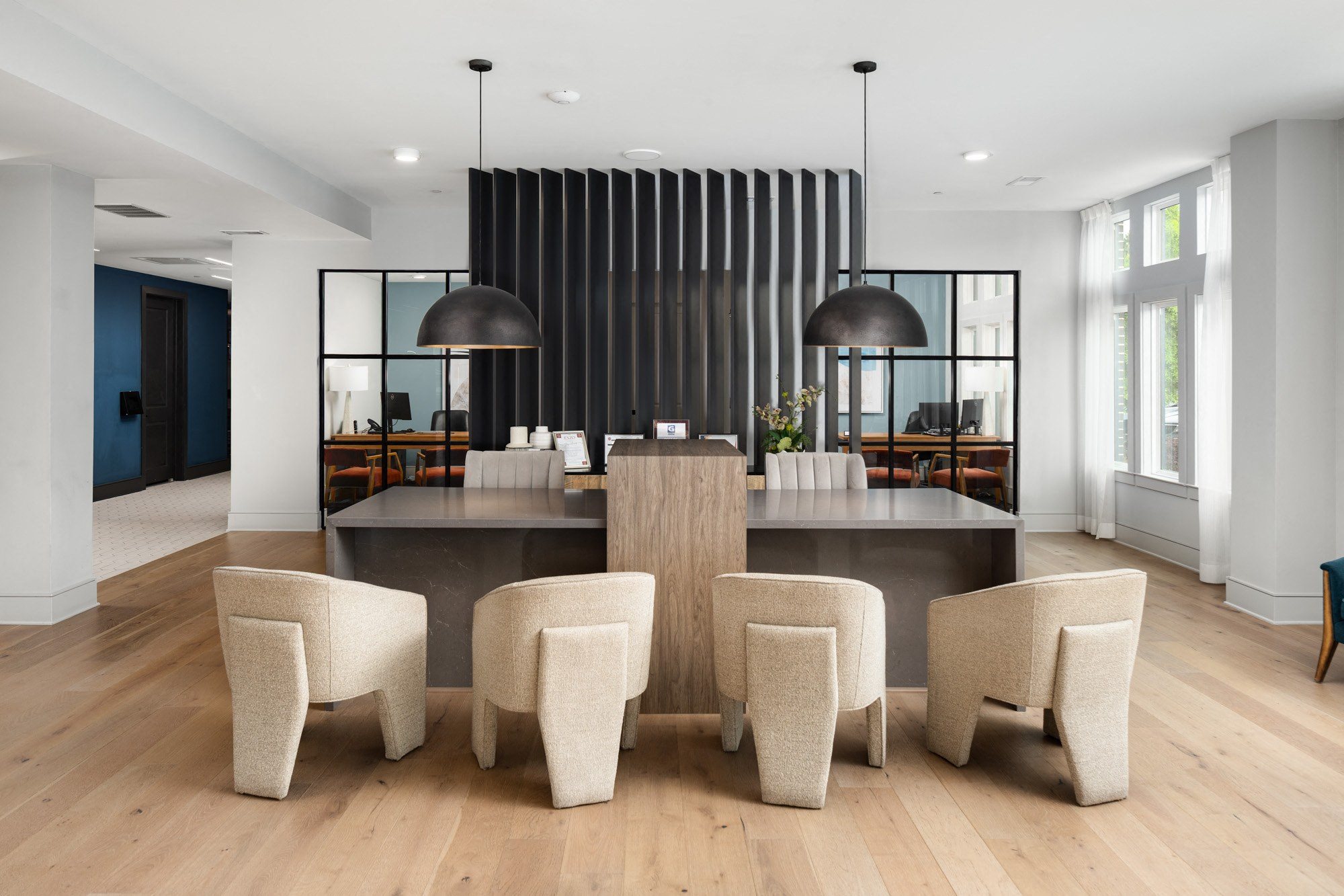 a large dining room with a large table and chairs